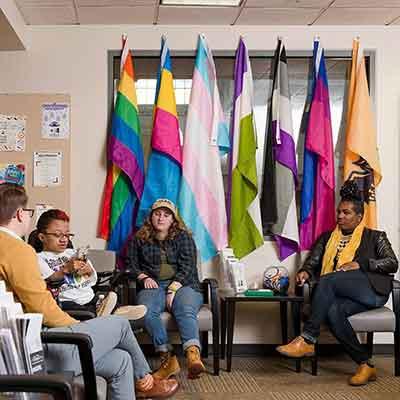 students sitting in the LGBTQ resource center